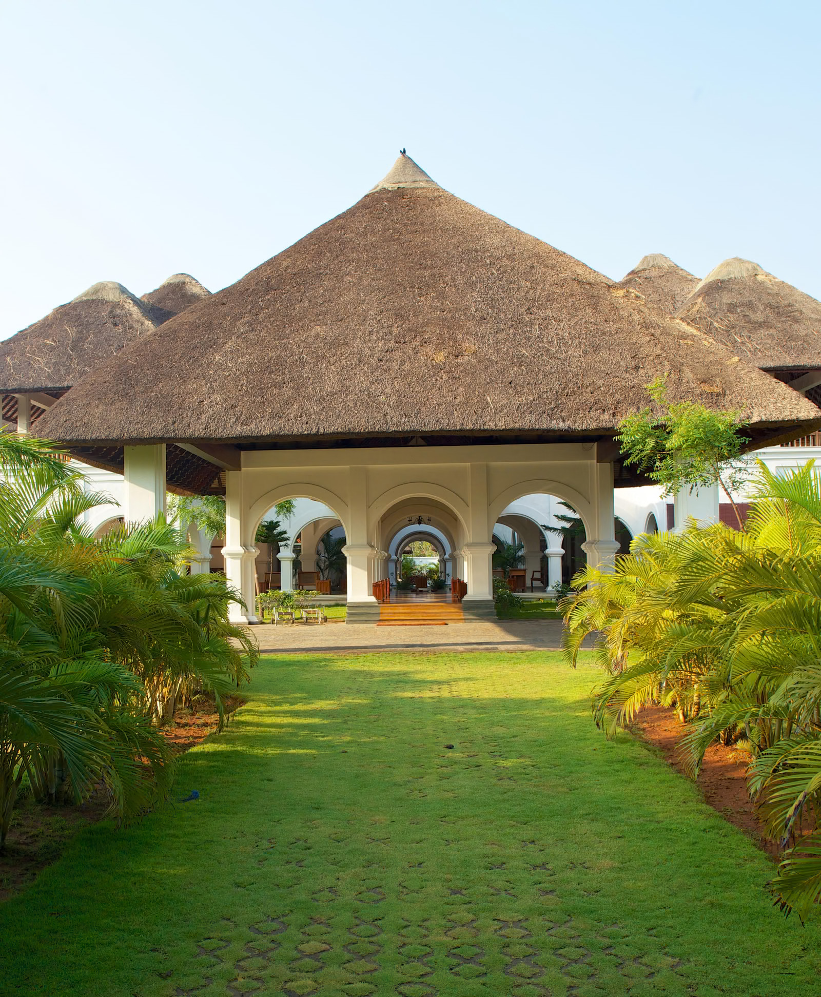 Le Pondy thatched-roof pavilion above the gardens