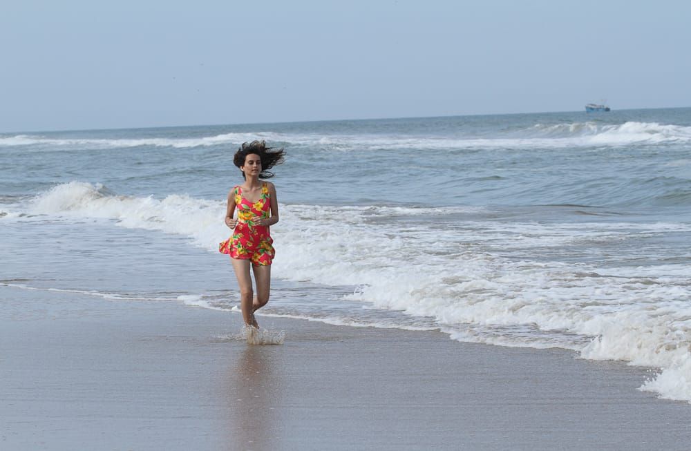 Sandy beach along the shoreline with ocean waves